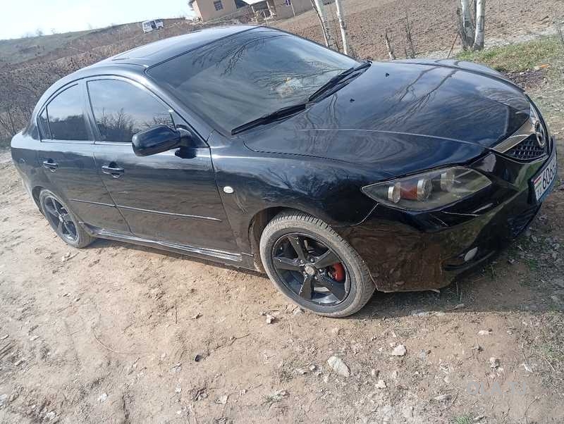 Mazda 323,  2007