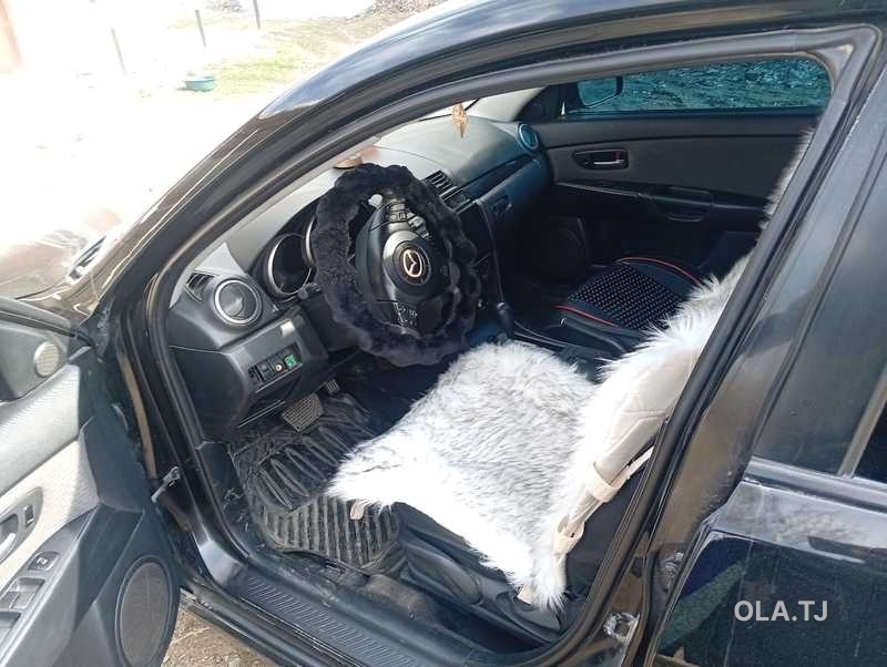 Mazda 323,  2007