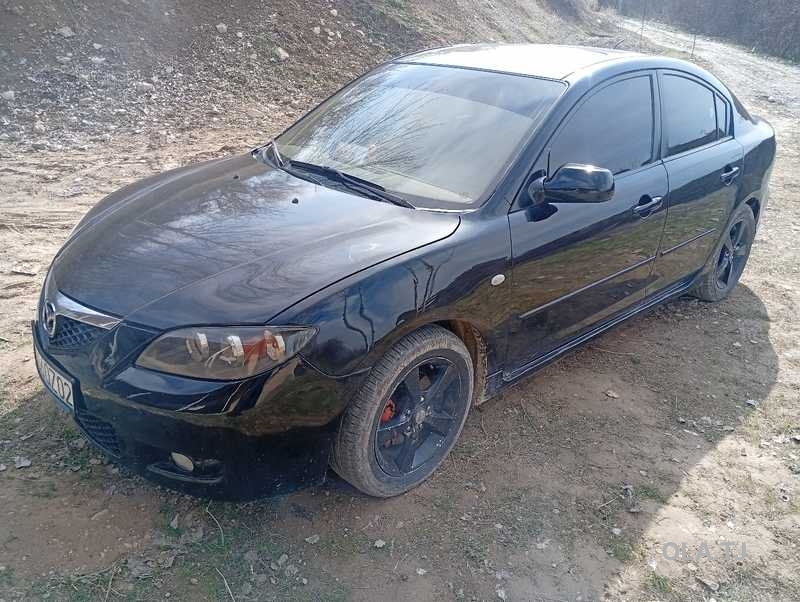 Mazda 323,  2007