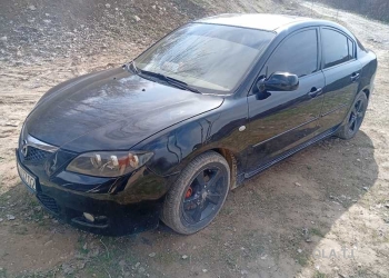 Mazda 323,  2007